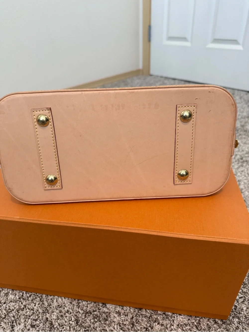 Louis Vuitton Monogram Alma Handbag in Brown and Tan